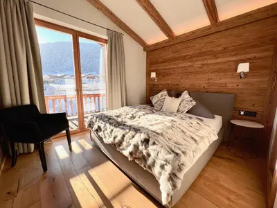 Ein Bett oder Betten in einem Zimmer der Unterkunft HIDEAWAY DESIGN CHALET by Belle Stay