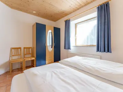Ein Bett oder Betten in einem Zimmer der Unterkunft Chapter Two