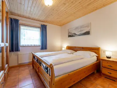 Ein Bett oder Betten in einem Zimmer der Unterkunft Chapter Two