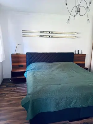 Ein Bett oder Betten in einem Zimmer der Unterkunft Bergurlaub Königsleiten