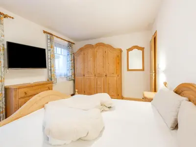 Ein Bett oder Betten in einem Zimmer der Unterkunft Chalet in Kaltenbach near Ski Lift