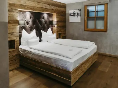 Ein Bett oder Betten in einem Zimmer der Unterkunft Chalet-Apartment Lavendel am Lift
