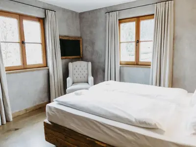 Ein Bett oder Betten in einem Zimmer der Unterkunft Chalet-Apartment Alpenrose am Lift