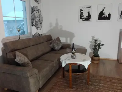 Ein Sitzbereich in der Unterkunft Appartement Juffinger
