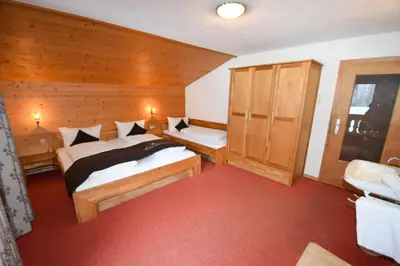 Ein Bett oder Betten in einem Zimmer der Unterkunft Ferienhaus Wachterhof Aschau im Zillertal