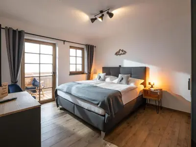 Ein Bett oder Betten in einem Zimmer der Unterkunft Alpenliebe Zillertal