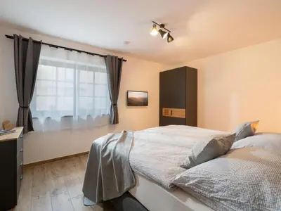 Ein Bett oder Betten in einem Zimmer der Unterkunft Alpenliebe Zillertal
