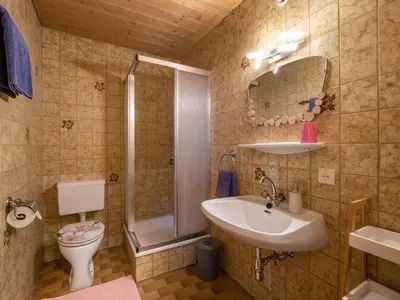 Ein Badezimmer in der Unterkunft Appartement Alpenlöwe