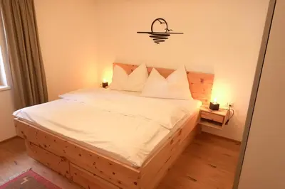 Ein Bett oder Betten in einem Zimmer der Unterkunft Ferienwohnung Wallner