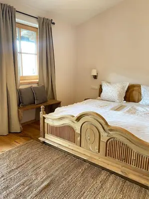 Ein Bett oder Betten in einem Zimmer der Unterkunft Wohnung in Kirchberg in Tirol