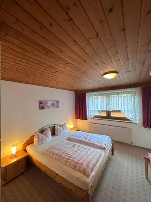 Ein Bett oder Betten in einem Zimmer der Unterkunft Haus Claudia