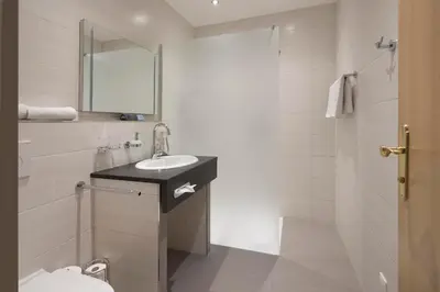 Ein Badezimmer in der Unterkunft Ferienhotel Fuchs