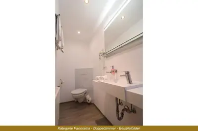 Ein Badezimmer in der Unterkunft Ferienhotel Fuchs