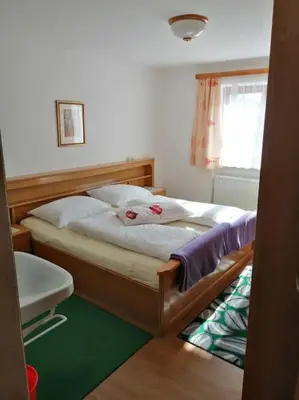 Ein Bett oder Betten in einem Zimmer der Unterkunft Familienferienwohnung Haus Praschberger