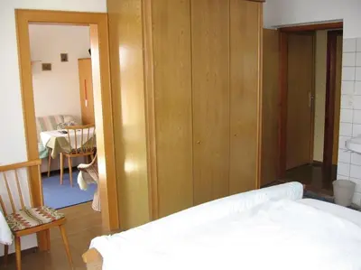 Ein Bett oder Betten in einem Zimmer der Unterkunft Familienferienwohnung Haus Praschberger