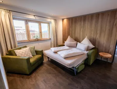Ein Bett oder Betten in einem Zimmer der Unterkunft Studio Weitblick