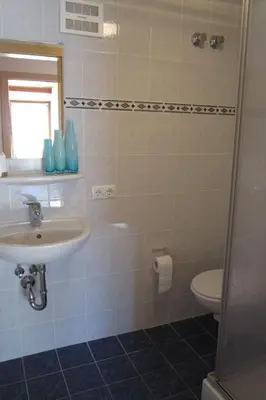 Ein Badezimmer in der Unterkunft Haus Jens