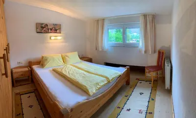 Ein Bett oder Betten in einem Zimmer der Unterkunft Ferienwohnung Zeller