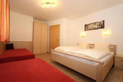 Ein Bett oder Betten in einem Zimmer der Unterkunft Ferienhaus Brandacher