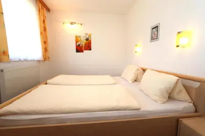 Ein Bett oder Betten in einem Zimmer der Unterkunft Ferienhaus Brandacher