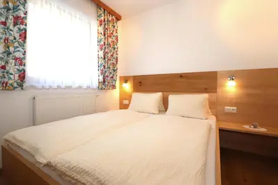 Ein Bett oder Betten in einem Zimmer der Unterkunft Ferienhaus Brandacher