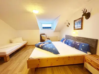 Ein Bett oder Betten in einem Zimmer der Unterkunft Ferienwohnungen Schiestl