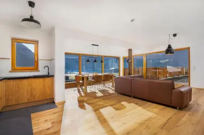 Ein Sitzbereich in der Unterkunft Exklusives Chalet-Haus mit Gletscherblick