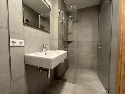 Ein Badezimmer in der Unterkunft Exklusives Chalet-Haus mit Gletscherblick