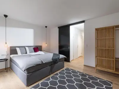 Ein Bett oder Betten in einem Zimmer der Unterkunft Zentral