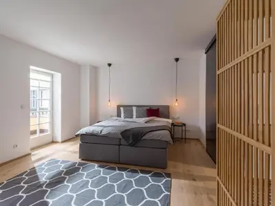 Ein Bett oder Betten in einem Zimmer der Unterkunft Zentral