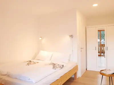 Ein Bett oder Betten in einem Zimmer der Unterkunft Haus Thussn, Ferienwohnung für Familien und Paare
