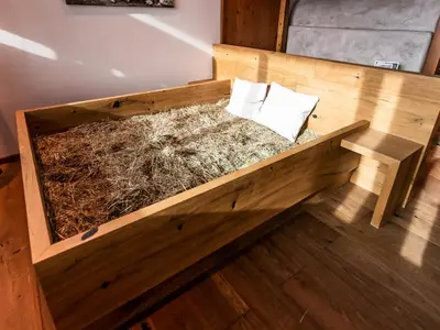Ein Bett oder Betten in einem Zimmer der Unterkunft Chalet H XL