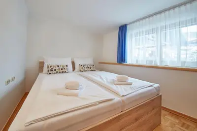 Ein Bett oder Betten in einem Zimmer der Unterkunft Marys Holiday Penthouse
