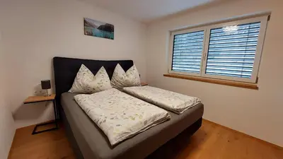 Ein Bett oder Betten in einem Zimmer der Unterkunft Apart Haselbach