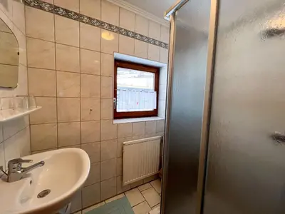 Ein Badezimmer in der Unterkunft Apartment Top 2 by Interhome