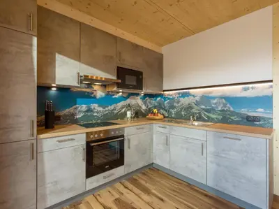 Küche/Küchenzeile in der Unterkunft Alpenchalets Oberlaiming