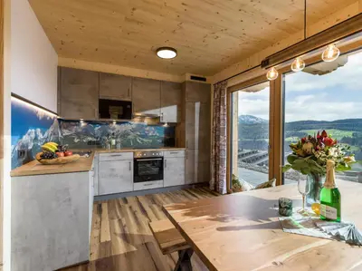 Küche/Küchenzeile in der Unterkunft Alpenchalets Oberlaiming