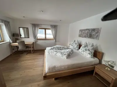Ein Bett oder Betten in einem Zimmer der Unterkunft Moarhof