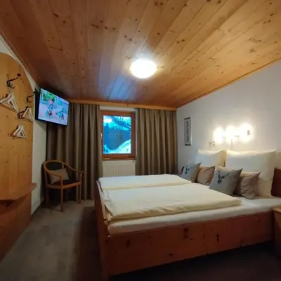 Ein Bett oder Betten in einem Zimmer der Unterkunft Ferienwohnung Ehrensberger