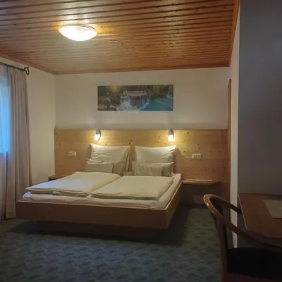 Ein Bett oder Betten in einem Zimmer der Unterkunft Ferienwohnung Ehrensberger