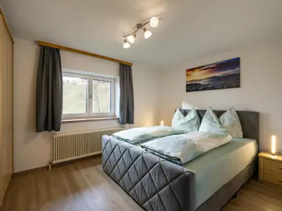 Ein Bett oder Betten in einem Zimmer der Unterkunft Haus Gletscherblick