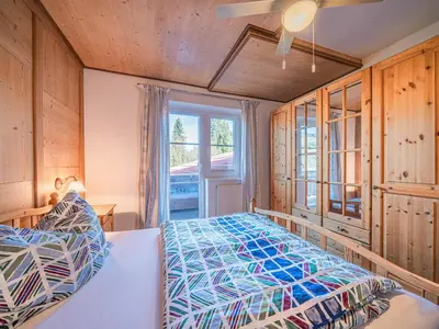 Ein Bett oder Betten in einem Zimmer der Unterkunft Glonersbühelhof Top 4
