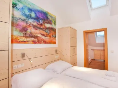 Ein Bett oder Betten in einem Zimmer der Unterkunft Apartment in Wald im Pinzgau near Ski Lift
