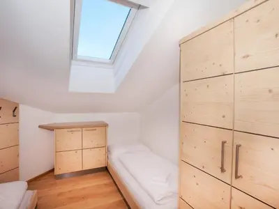 Ein Bett oder Betten in einem Zimmer der Unterkunft Apartment in Wald im Pinzgau near Ski Lift