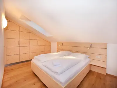 Ein Bett oder Betten in einem Zimmer der Unterkunft Apartment in Wald im Pinzgau near Ski Lift