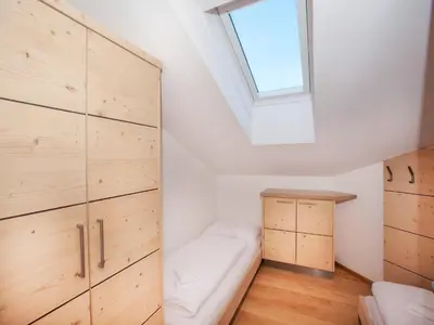 Ein Bett oder Betten in einem Zimmer der Unterkunft Apartment in Wald im Pinzgau near Ski Lift