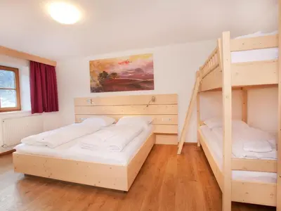 Ein Bett oder Betten in einem Zimmer der Unterkunft Chalet in Pinzgau near Wildkogel Arena