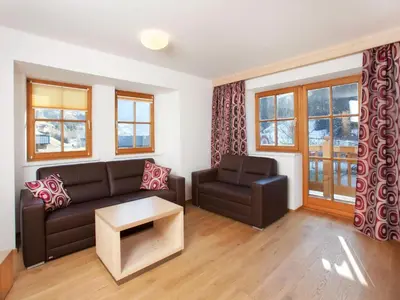 Ein Sitzbereich in der Unterkunft Apartment Wald im Pinzgau near Ski Lift