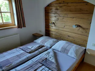 Ein Bett oder Betten in einem Zimmer der Unterkunft BIO Bauernhof GEISL