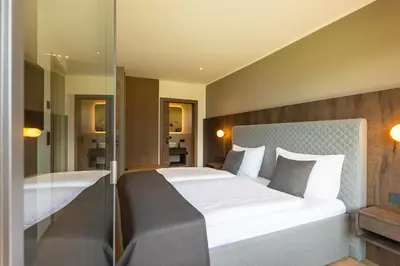 Ein Bett oder Betten in einem Zimmer der Unterkunft Fankhauser Apartments